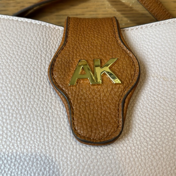 Anne Klein Pink with Tan Trim Faux Pebbled Leather Crossbody Bag - Picture 4 of 12